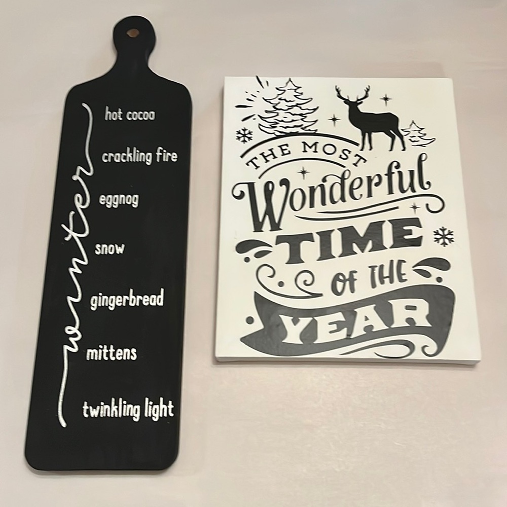 Set of one wooden and one canvas holiday sign